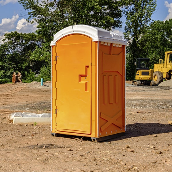 how often are the portable restrooms cleaned and serviced during a rental period in Adams